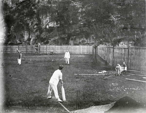 Byrde and Parker playing cricket in a garden, Yungchow