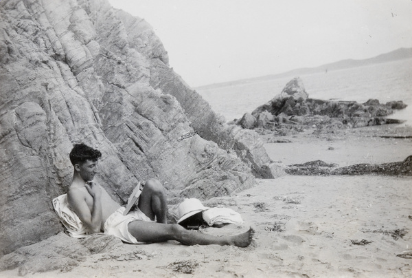 F. Hagger reading on the beach, Huangpu (黃埔), Guangzhou (廣州)