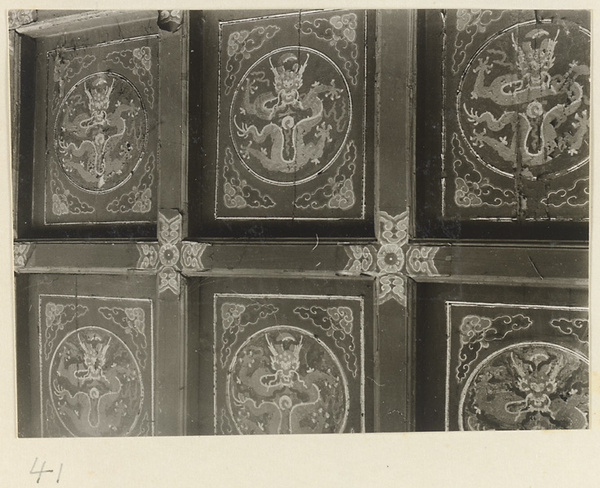 Detail of a coffered ceiling at Xi yu si showing panels with dragon motifs