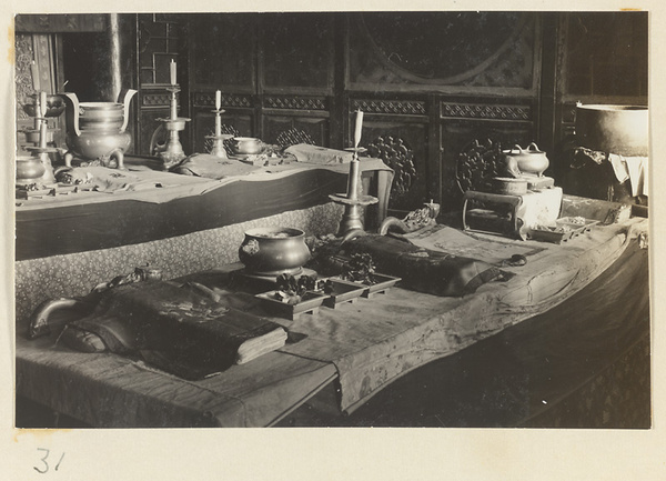 Temple interior at Xi yu si showing an altar with ritual objects