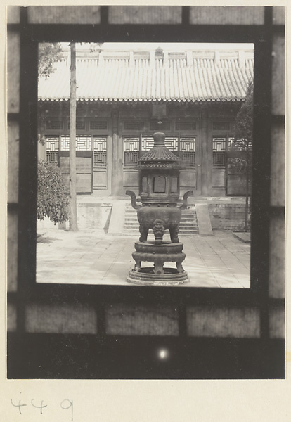Incense burner in temple courtyard at Fa yuan si