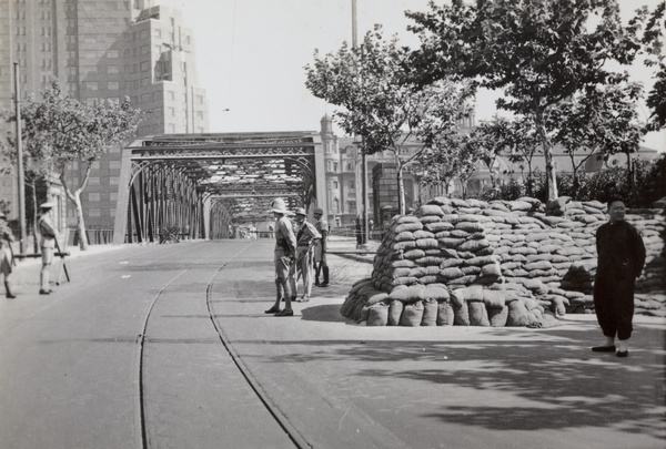 Soldiers at a sandbagged guard post, Garden Bridge, the Bund, Shanghai, 1937