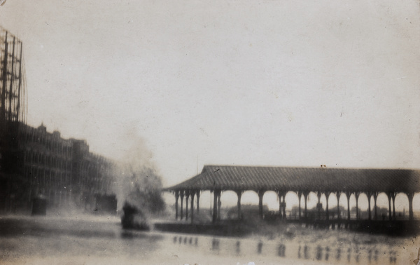 Waves breaking over the Praya at Blake Pier during a typhoon, Hong Kong
