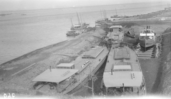 Tug and boats in dry dock near Antung