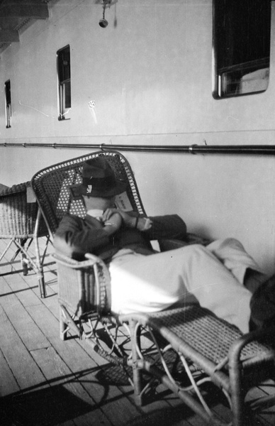 Passenger snoozing on 'SS Empress of Asia'