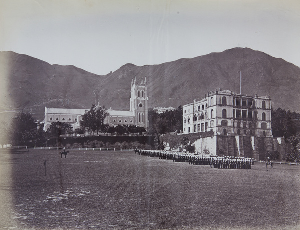 The 18th Regiment of Foot on parade below St John's Cathedral and Johnston’s House (Augustine Heard & Co), Hong Kong