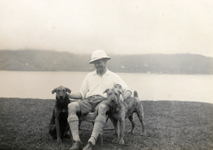 Man with two dogs