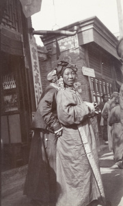 A woman wearing a jewelled headdress