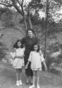 Lilian Thoresen with daughters, Patricia and Kristine, in an area above a Castle Peak Road beach, Hong Kong