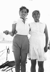 Two unidentified women on a ferry boat, Hong Kong