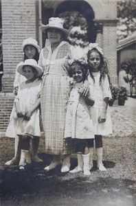 Maggie Hutchinson with Nora, Hannah and two unidentified girls in the garden, 35 Tongshan Road, Hongkou, Shanghai