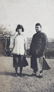 Mrs and Mr Koskey wearing Chinese style clothing in the garden, 35 Tongshan Road, Hongkou, Shanghai