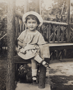 Bea Hutchinson sitting in the garden summer house, 35 Tongshan Road, Hongkou, Shanghai, July 1924 