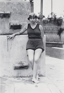 Young woman wearing a bathing costume and cap at the Open Air Pool, Hongkou, Shanghai, 1924