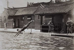 Harry Hutchinson watching Booby diving into the deep end of the Open Air Pool, Hongkou, Shanghai, 1925