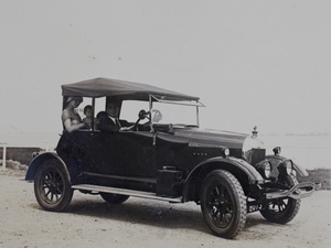 John Piry at the wheel of his Morris-Cowley motorcar, with Sarah, Gladys and Bea Hutchinson in the back passenger seat, Shanghai