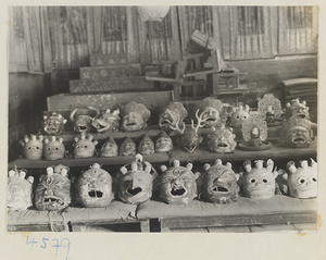 Interior of Zhao Fo lou showing masks used at New Year's devil dance