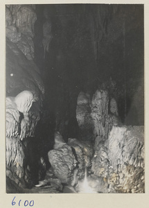 Cave interior with offerings at the Xincheng Caves