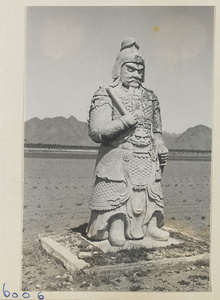 Stone warrior holding a baton on Shen Dao leading to the Ming tombs