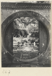 Moon gate with a view of Yang ren feng courtyard and Fan Hall
