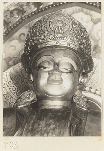 Detail of a statue of a Bodhisattva showing head and crown at Wan shou si