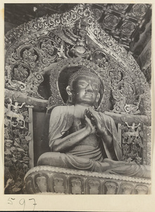 Temple interior showing Buddha statue at Huang si