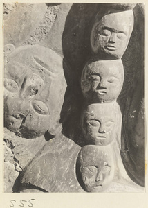 Detail of relief at Yuquan Hill showing head and necklace of skulls