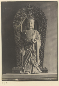 Interior of Wan shan dian showing statue of Buddha