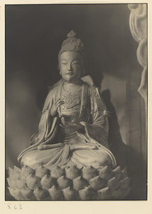 Interior of Wan shan dian showing statue of Bodhisattva seated on a lotus throne
