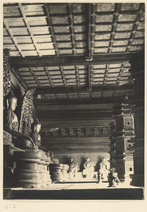 Interior of Da zi zhen ru dian showing Buddha statues, Luohans, and miniature storied pagodas