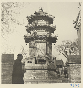 Triple-eaved storied pagoda in a courtyard at Bai yun guan