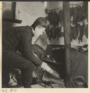 Man at work in a metal-working shop