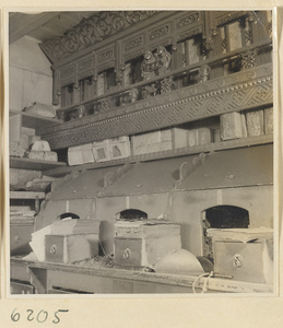 Tobacco shop interior showing storage shelves and counter with packaging equipment