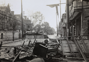 Barricades and guard post at Range Road between Kiangse Road and Szechuen Road, September 1937