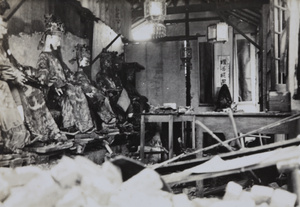 War damage to figures in Longhua Temple, Shanghai, September 1937