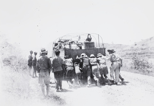 Pushing a lorry, during the retreat from Guilin, 1944