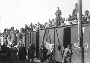 Soldiers on train carriages, during the retreat from Guilin, 1944