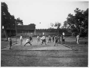 Eighth Route Army soldiers playing volleyball outside a town in Central Hebei province (冀中), 1938