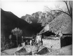 A group of guerilla soldiers by a mountain hut in Pingxi district, west of Beijing
