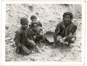 Road builders - a man and three children