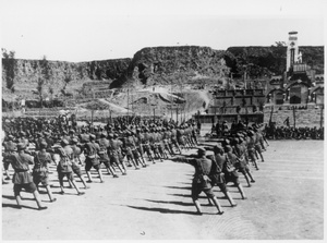 Soldiers drilling, in front of the Jinchaji Border Region War Resistance Martyrs' Memorial (晋察冀边区抗战烈士纪念塔), Tang County (唐县), Hebei Province