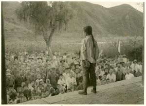 A female youth organisation leader addressing a mass rally in Pinghxi