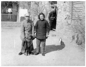 Head teacher Cheng Fangwu, his wife Zhang Lin, and child (The Lindsays stayed at his school overnight)