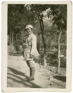 An unidentified Chinese man in uniform with a bag, Yan'an (延安)
