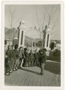 Children by the entrance to Dr Norman Bethune (白求恩)'s grave and memorial, Tang County (唐县), Hebei Province
