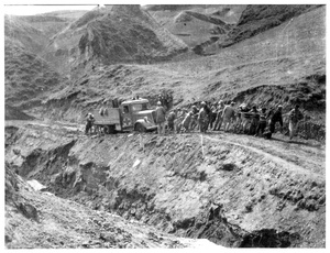 The Lindsay's lorry being pulled out of mud, on the road from Suide (绥德县) to Yan'an (延安), 1944