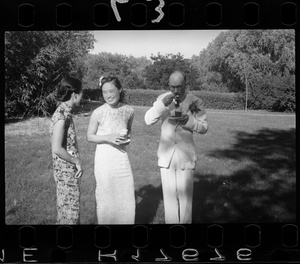 Hsiao Li Lindsay (李效黎) and Michael Lindsay (林迈可) with a guest, at their wedding party at Yenching University (燕京大學), Beijing (北京)