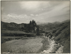 A track by a field - in the distance is Mount Langya (狼牙山 Wolf's Tooth Mountain), Hebei
