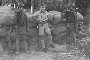 Nationalist soldiers at a checkpoint with press photographer George Lacks, Shanghai