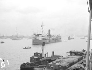 Ship and lighters with tugs 'Neptune' and 'Chang Woo', Shanghai